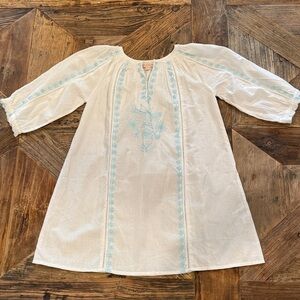 Pink Chicken White tunic with Blue Embroidery: best to layer with slip or tank.